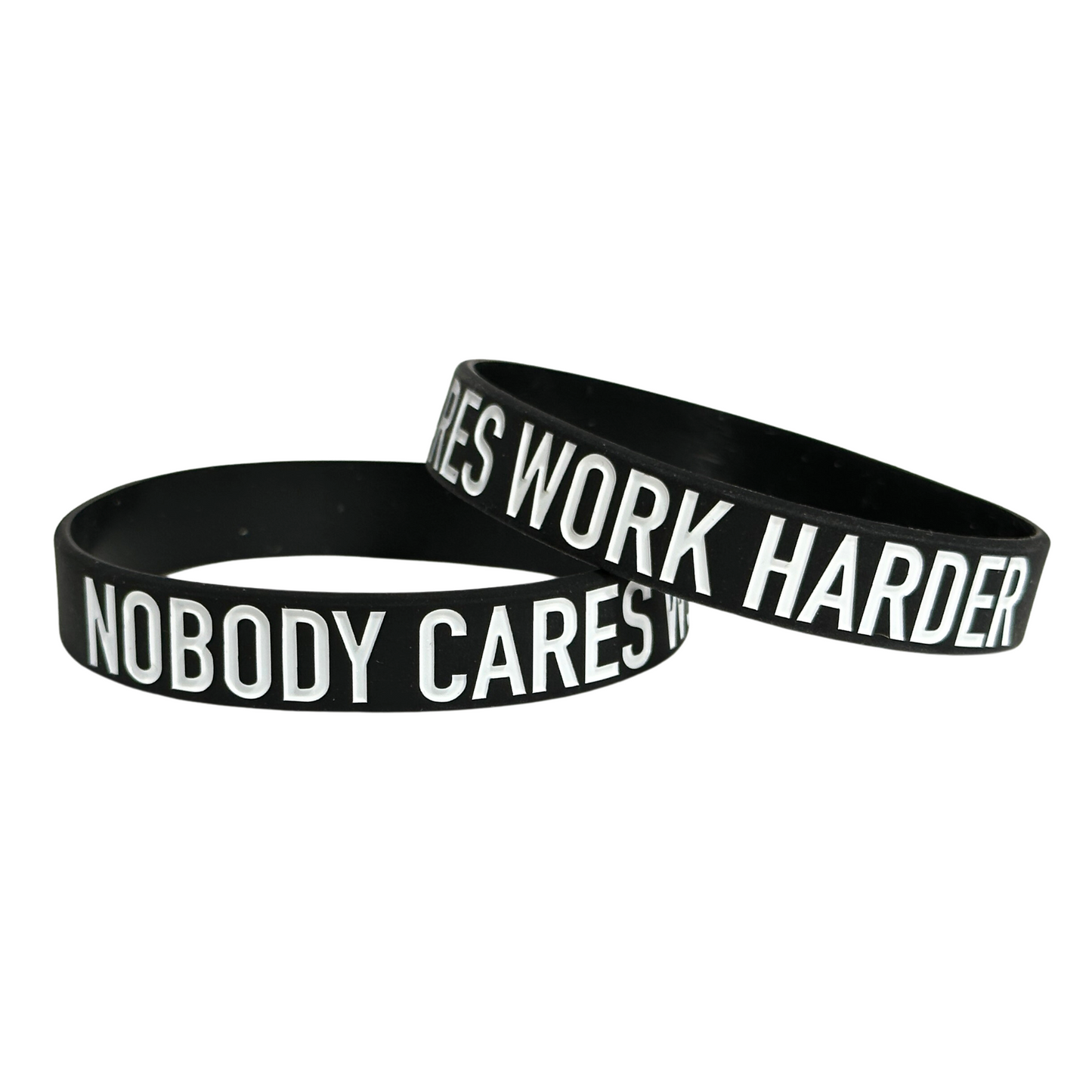 A black silicone bracelet with the phrase "Nobody Cares, Work Harder" etched in bold white letters, serving as a powerful reminder to push beyond limitations and strive for success